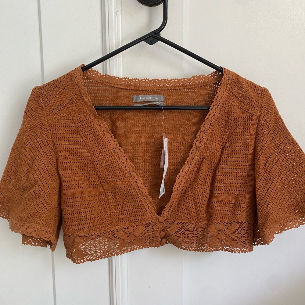 Cropped short sleeve three button sweater